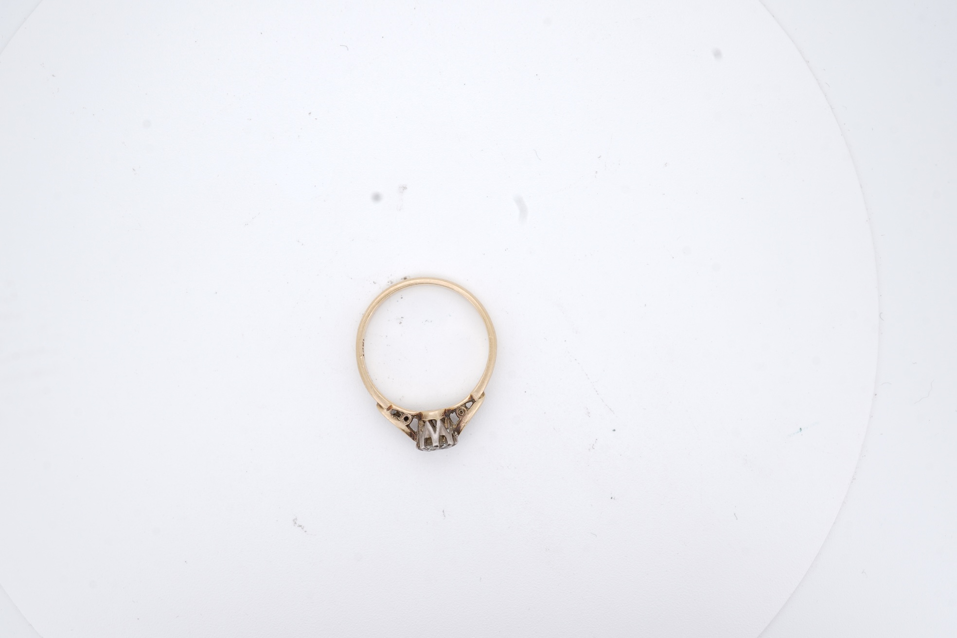 An 18ct and solitaire diamond set ring, the stone weighing approximately 0.30ct, size N, gross weight 2.8 grams.
